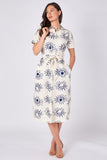 Cream sun print midi shirt dress side angled view